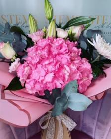 Standard size pinks with lilies 